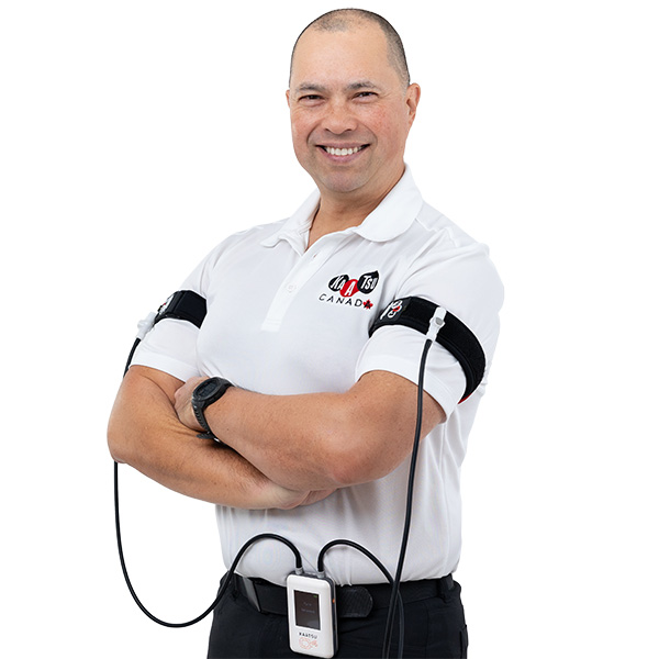 mark-kaatsu-c4-600 Mark Kawabe, co-owner of KAATSU Canada, wearing a KAATSU C4 system