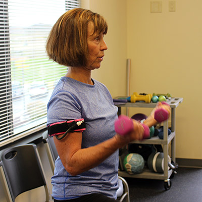 Woman working out with KAATSU